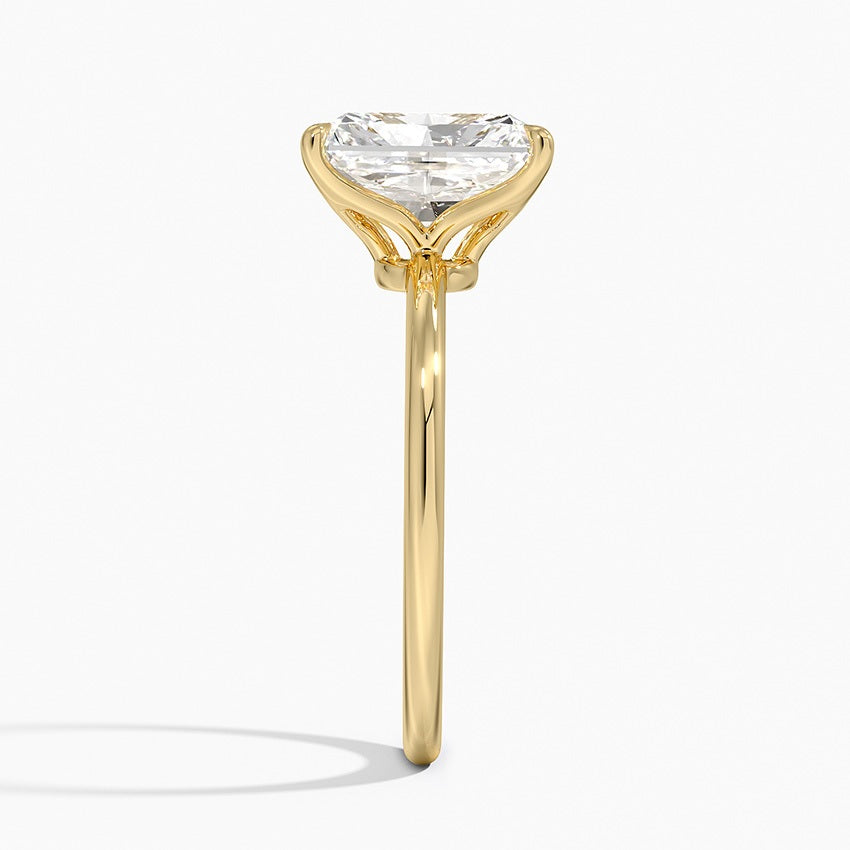 Elongated Yellow Gold Radiant Cut Diamond Solitaire