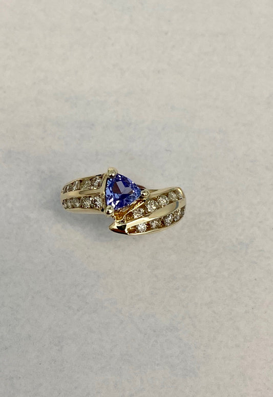 Trilliant-Cut Yellow Gold Tanzanite ring accented with Full-Cut Round Diamonds